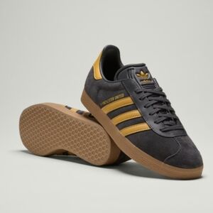 Adidas Black and Gold Sneakers